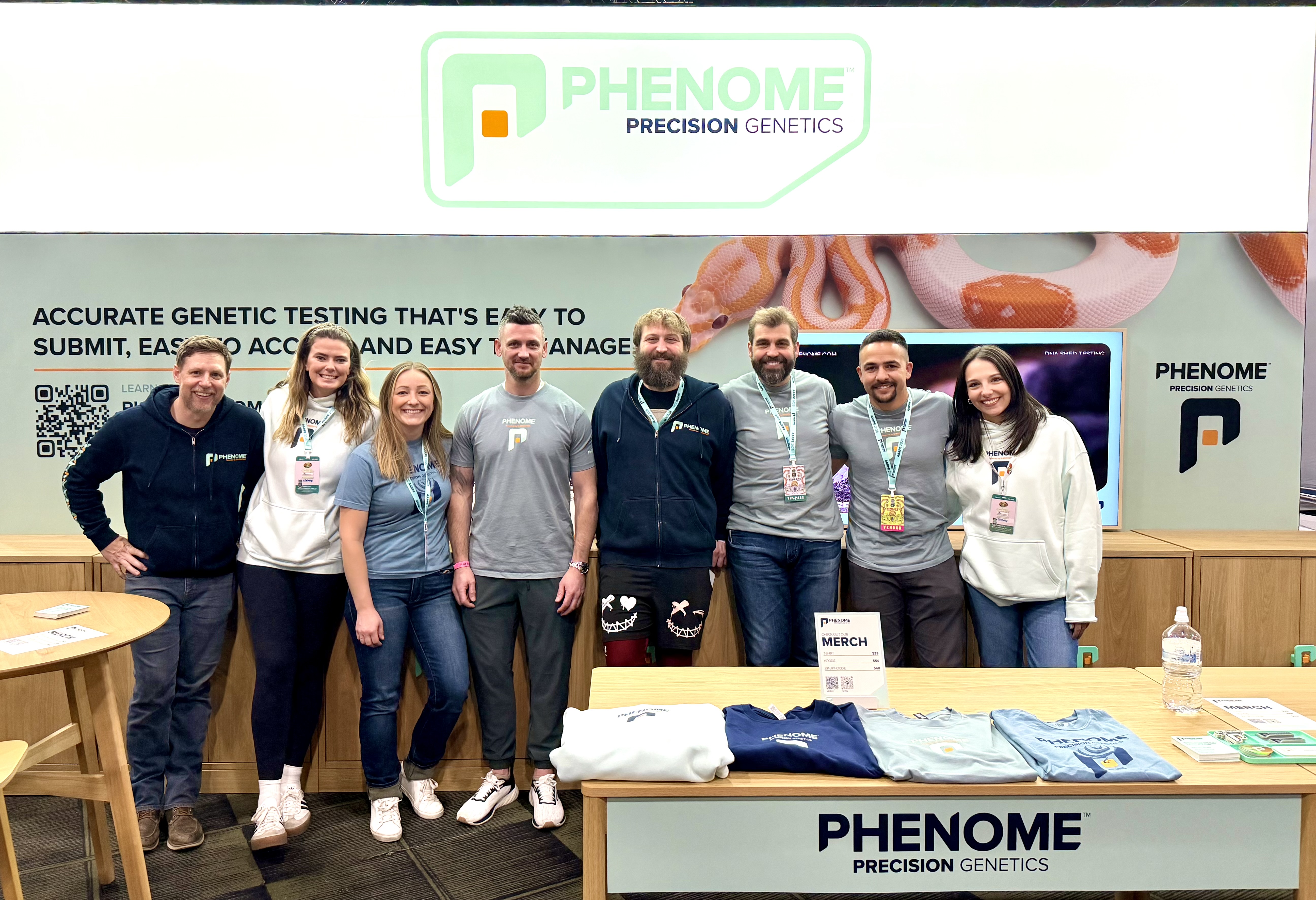 Group photo at the Phenome Precision Genetics booth